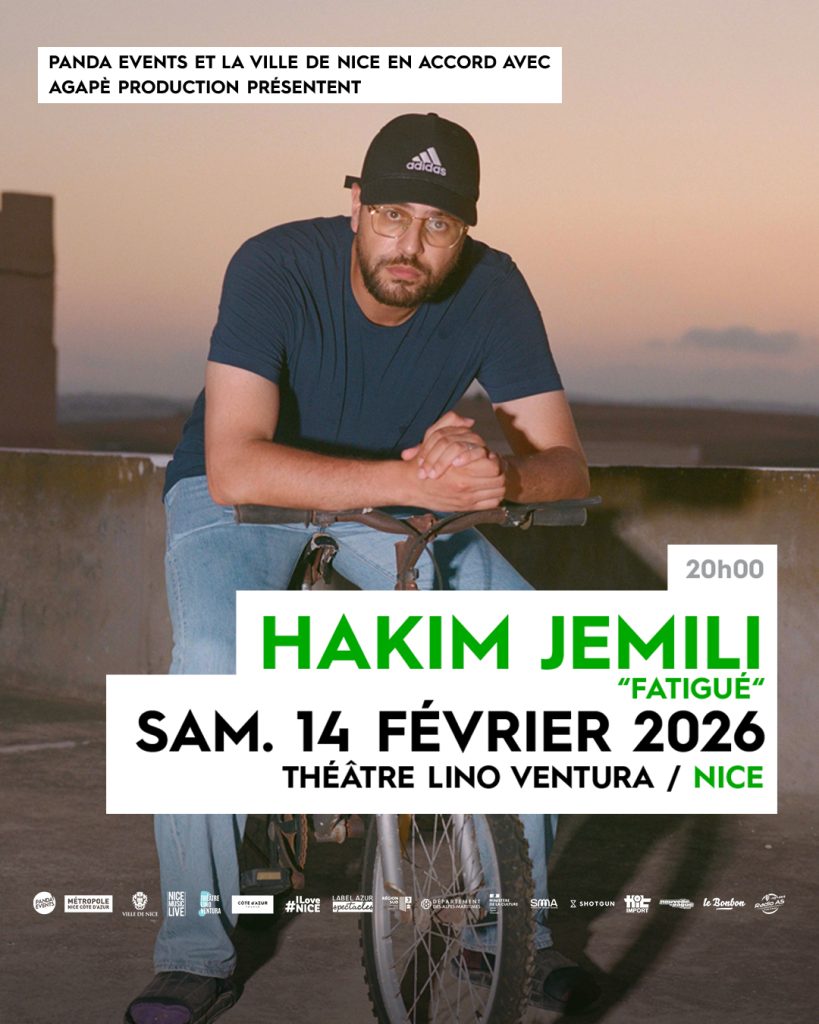 Portrait d'Hakim Jemili sur un vélo, avec un coucher de soleil en arrière-plan, annonçant son spectacle "Fatigué" au Théâtre Lino Ventura à Nice, le samedi 14 février 2026 à 20h.